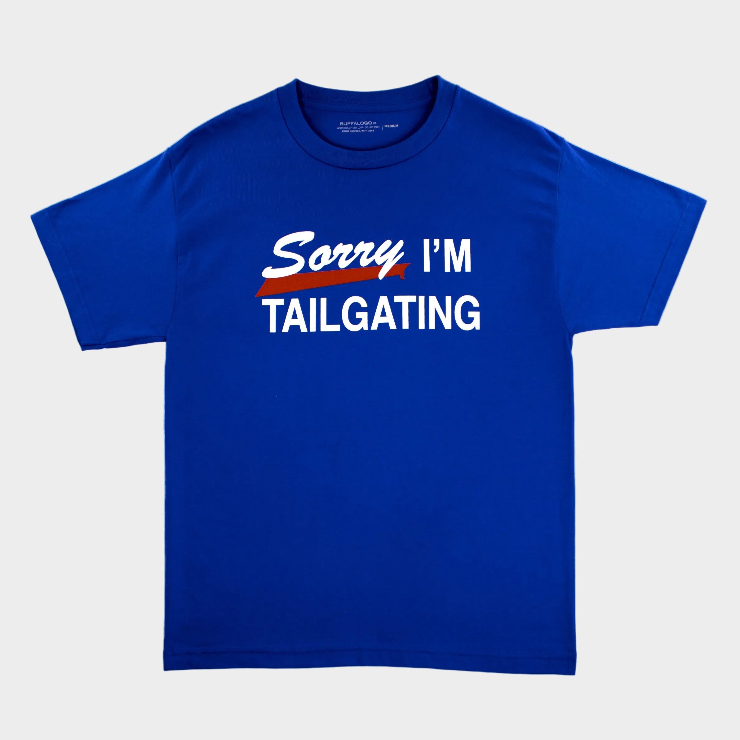 Blue t-shirt with 'Sorry I'm Tailgating' text on a white background