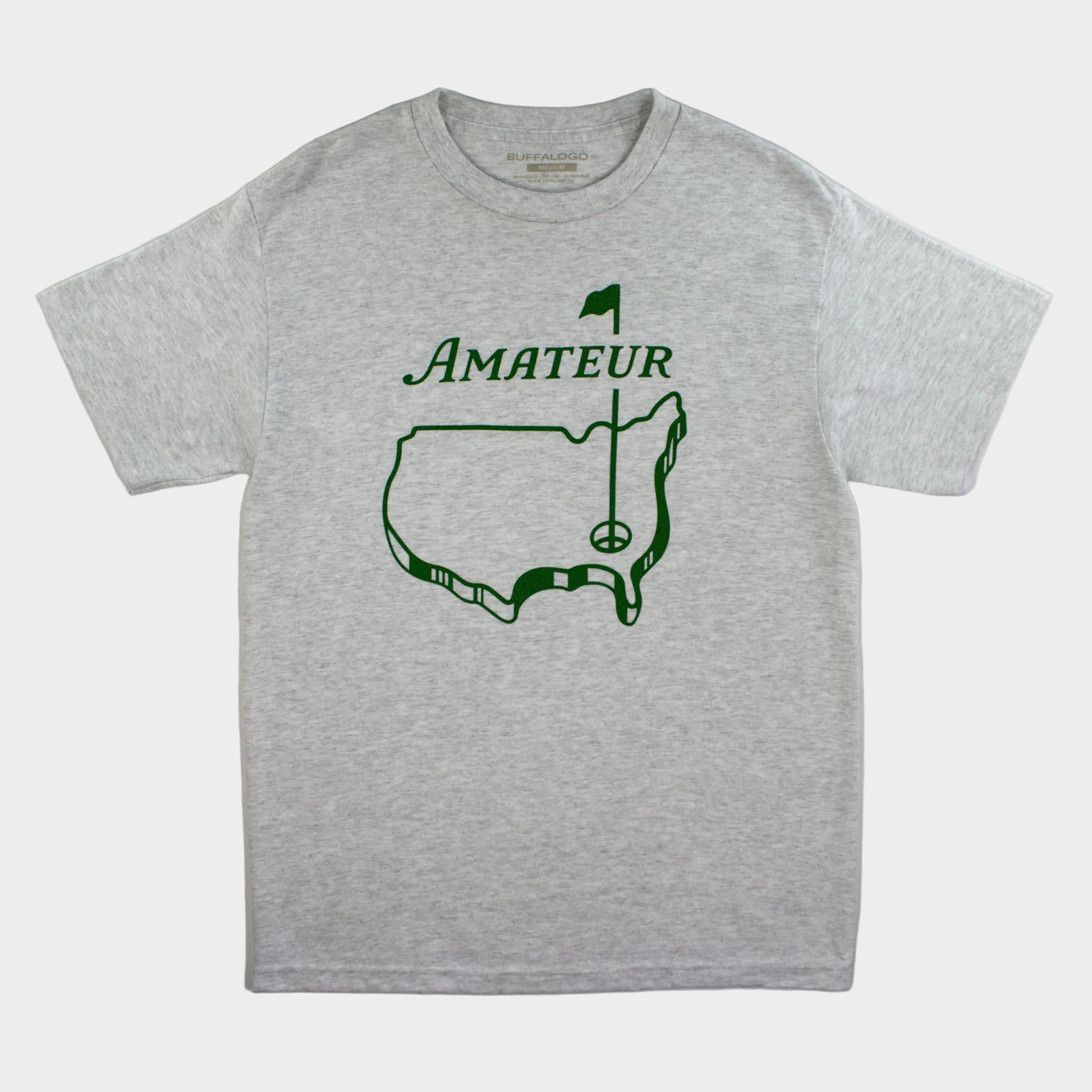 Gray t-shirt with green graphic and text 'AMATEUR' on a light gray background