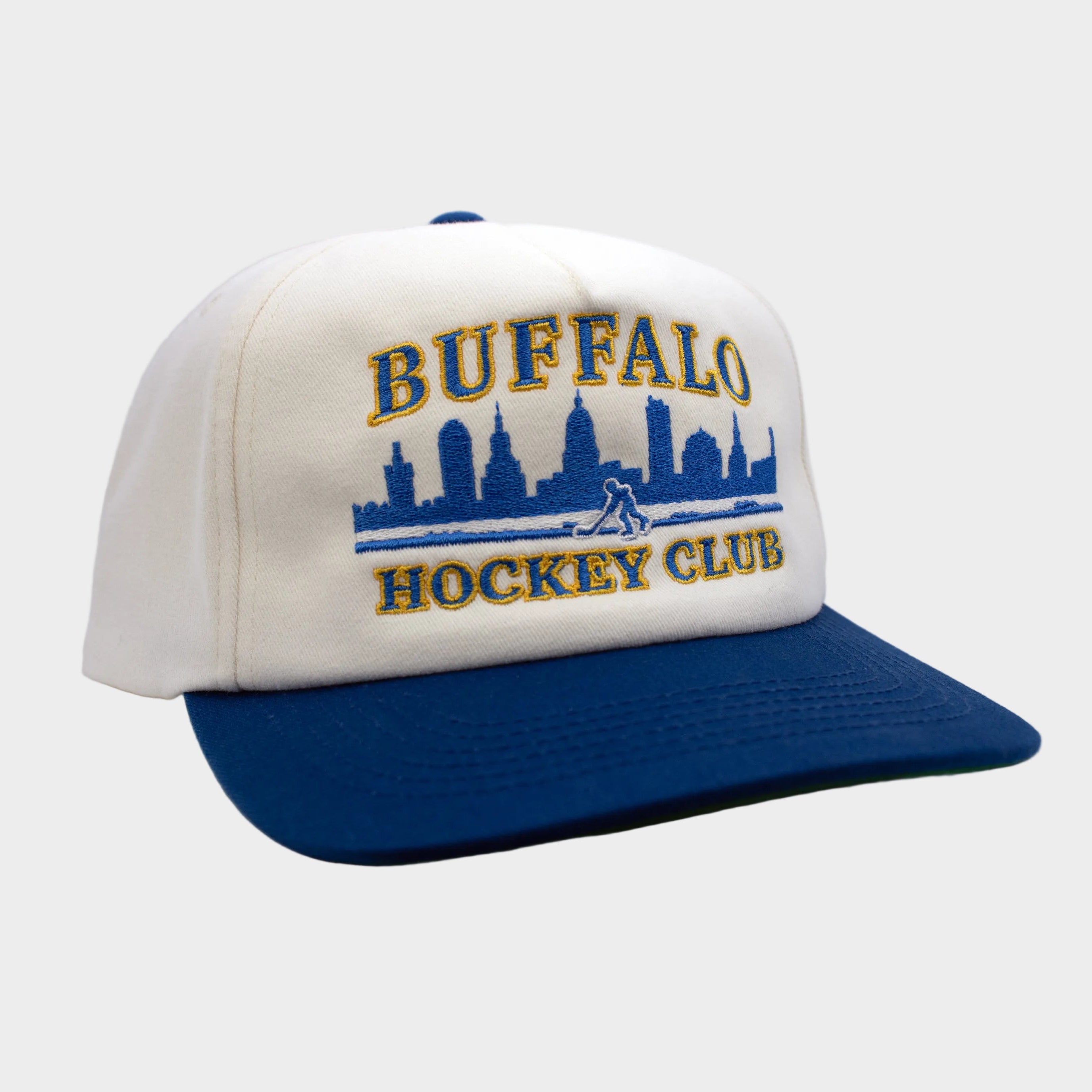 Cap with 'Buffalo Hockey Club' text and skyline design on a white background