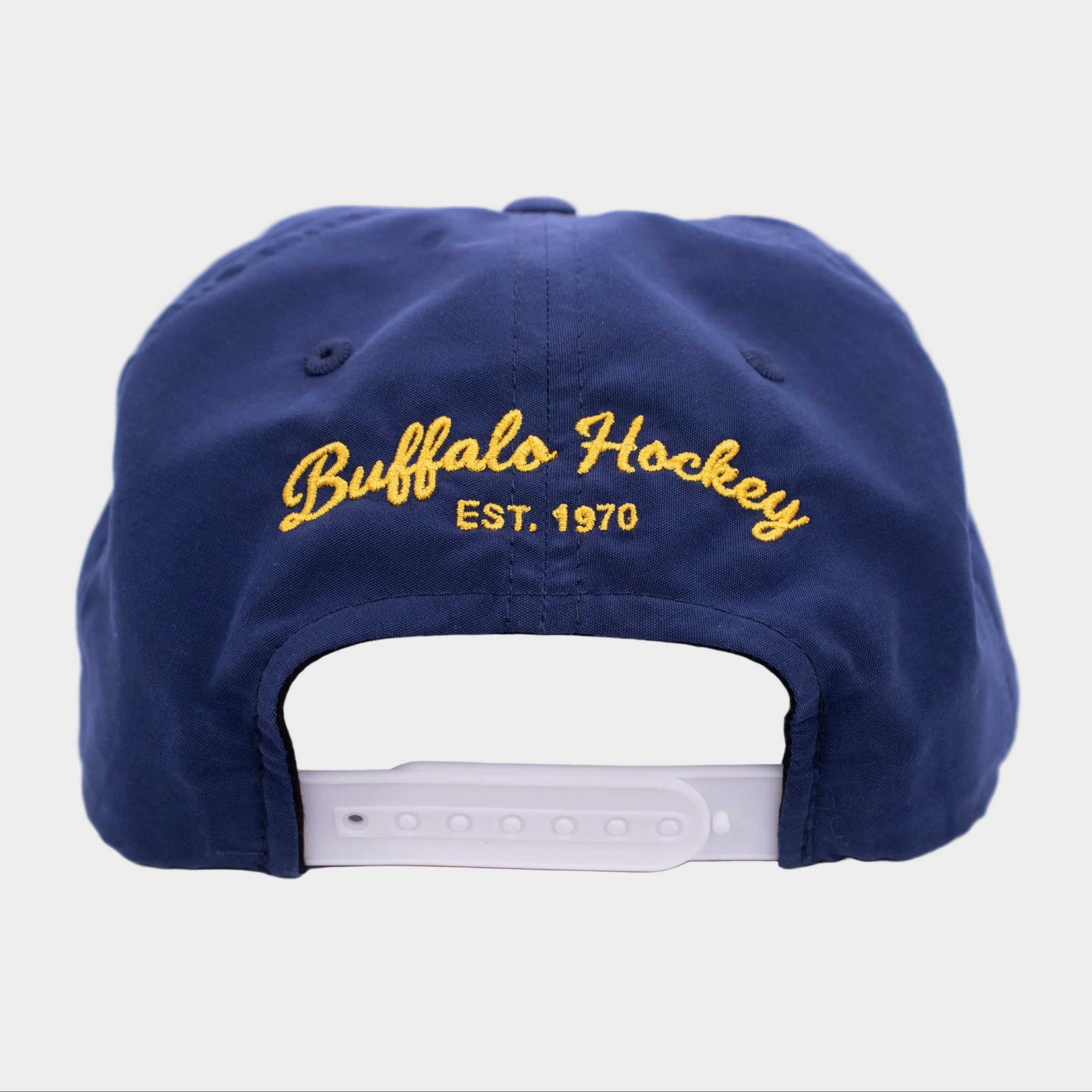 Navy blue cap with 'Buffalo Hockey EST. 1970' text on a white background
