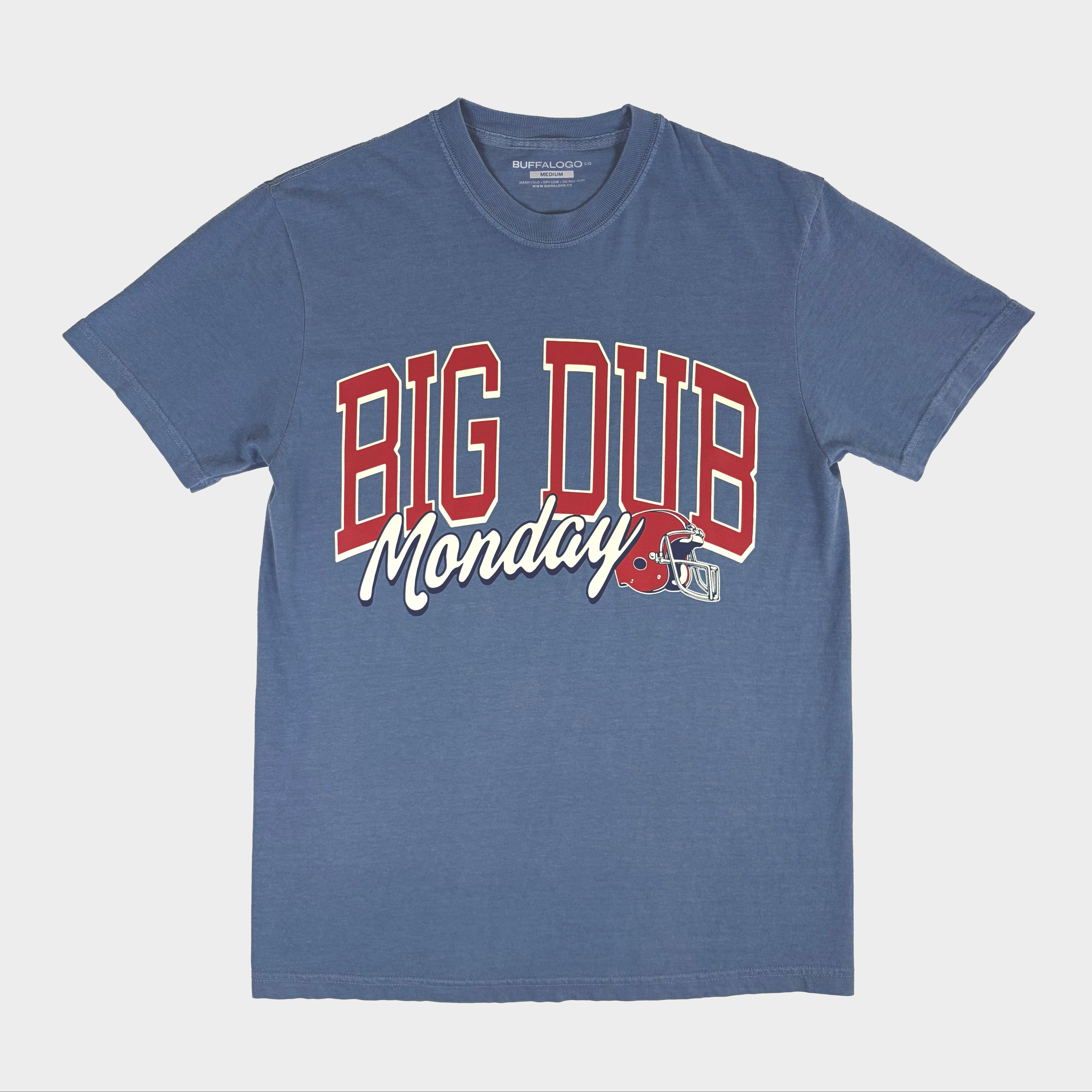Blue t-shirt with 'BIG DUB Monday' text on a white background
