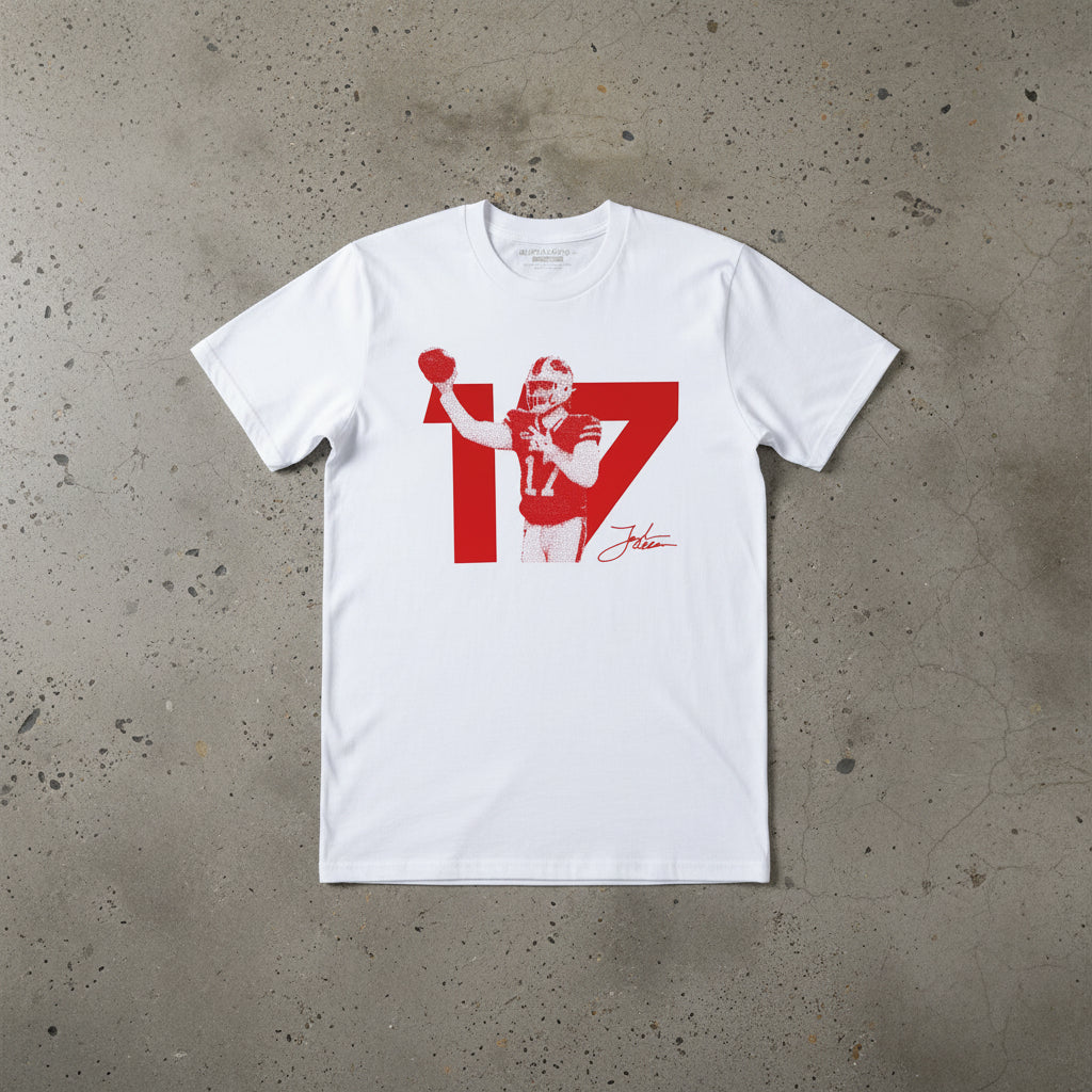 White t-shirt with red graphic of a football player and number 17 on a white background